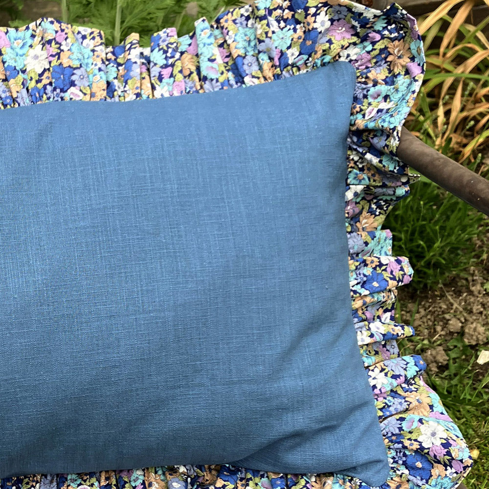 Oblong scatter cushion. Blue natural fabric.