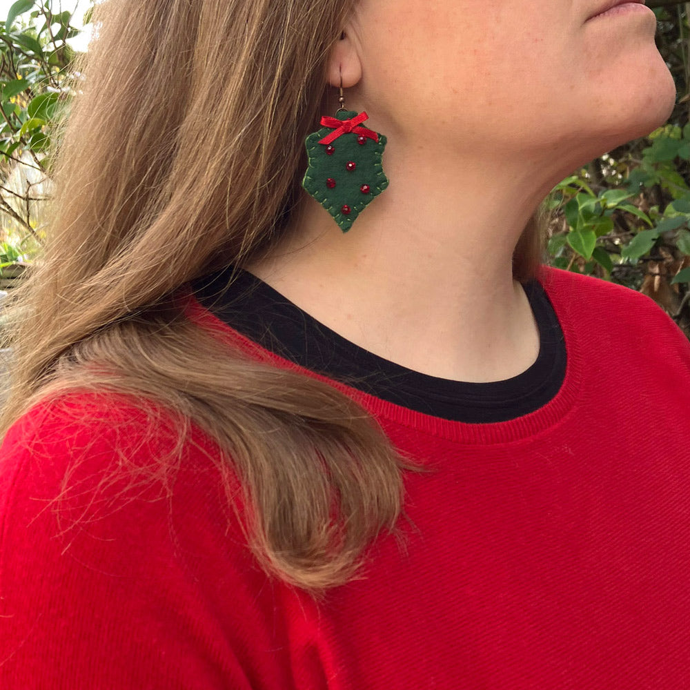 Christmas Holly earrings with red beads and ribbon. Made from natural felt, lightweight and comfortable to wear.