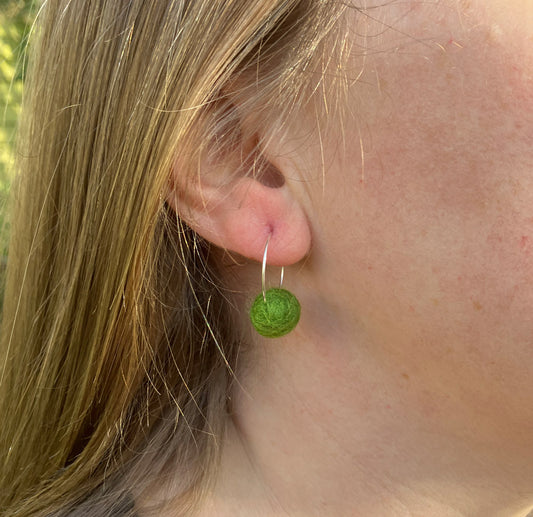Green Felted Wool Pom Pom Earrings with silver plated hoops.