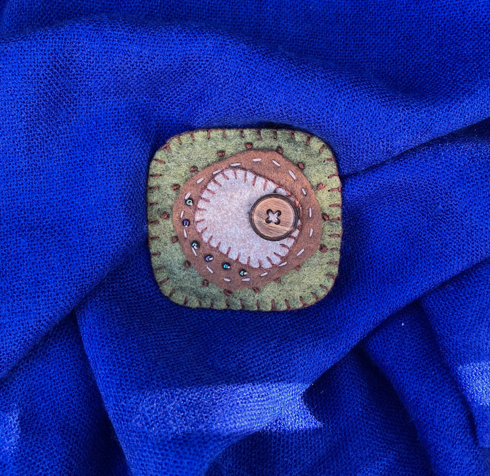 Felt brooch with wooden button and beads. Hand stitched. Green brown