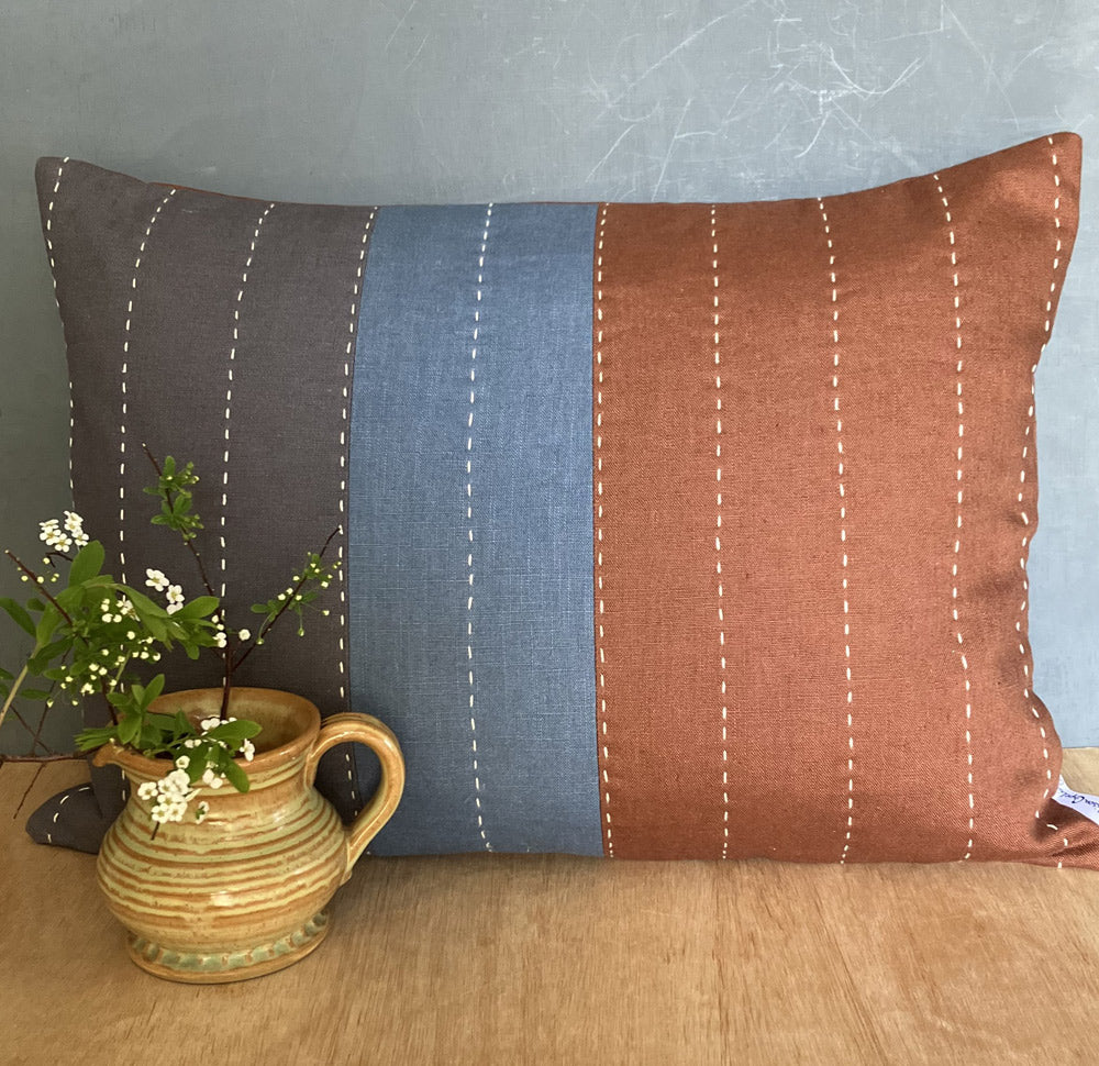 Handmade luxury scatter cushion in natural linen.