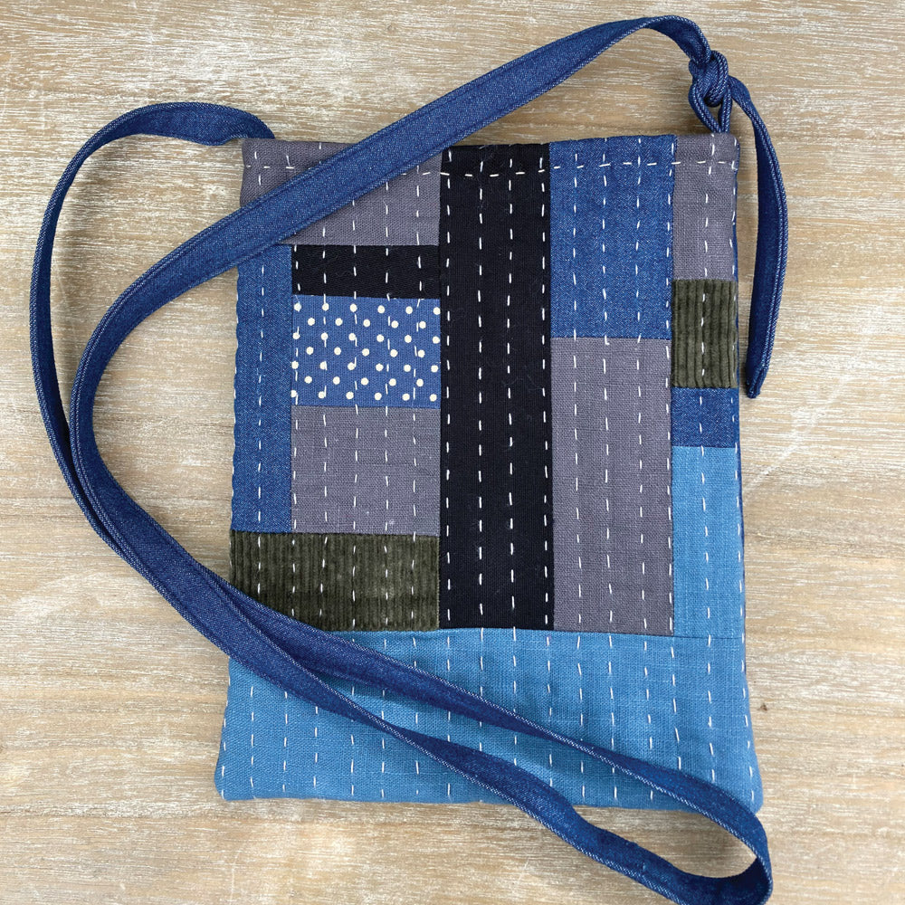 Fabric handmade shoulder bag, made in blue linen, cotton, denim and cord. Slow stitch.