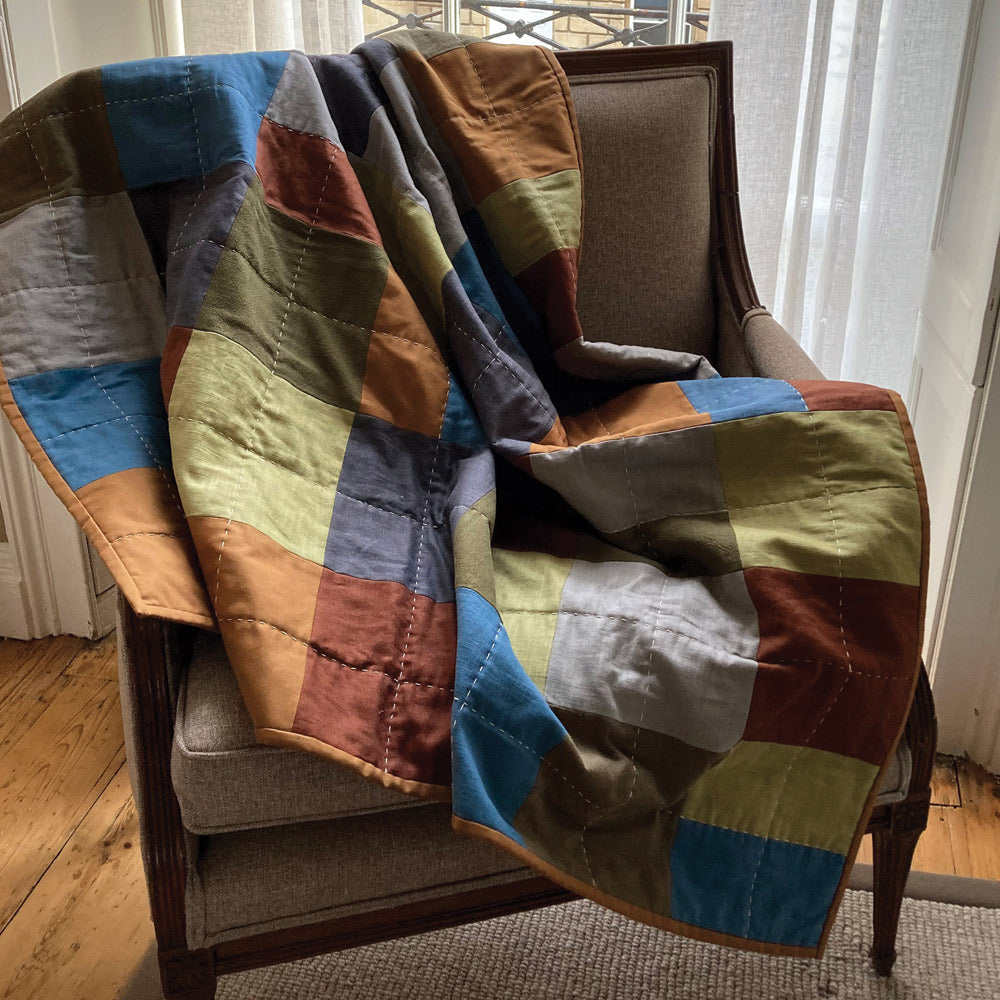 A contemporary farm house style quilt / throw. Linen and Cotton.