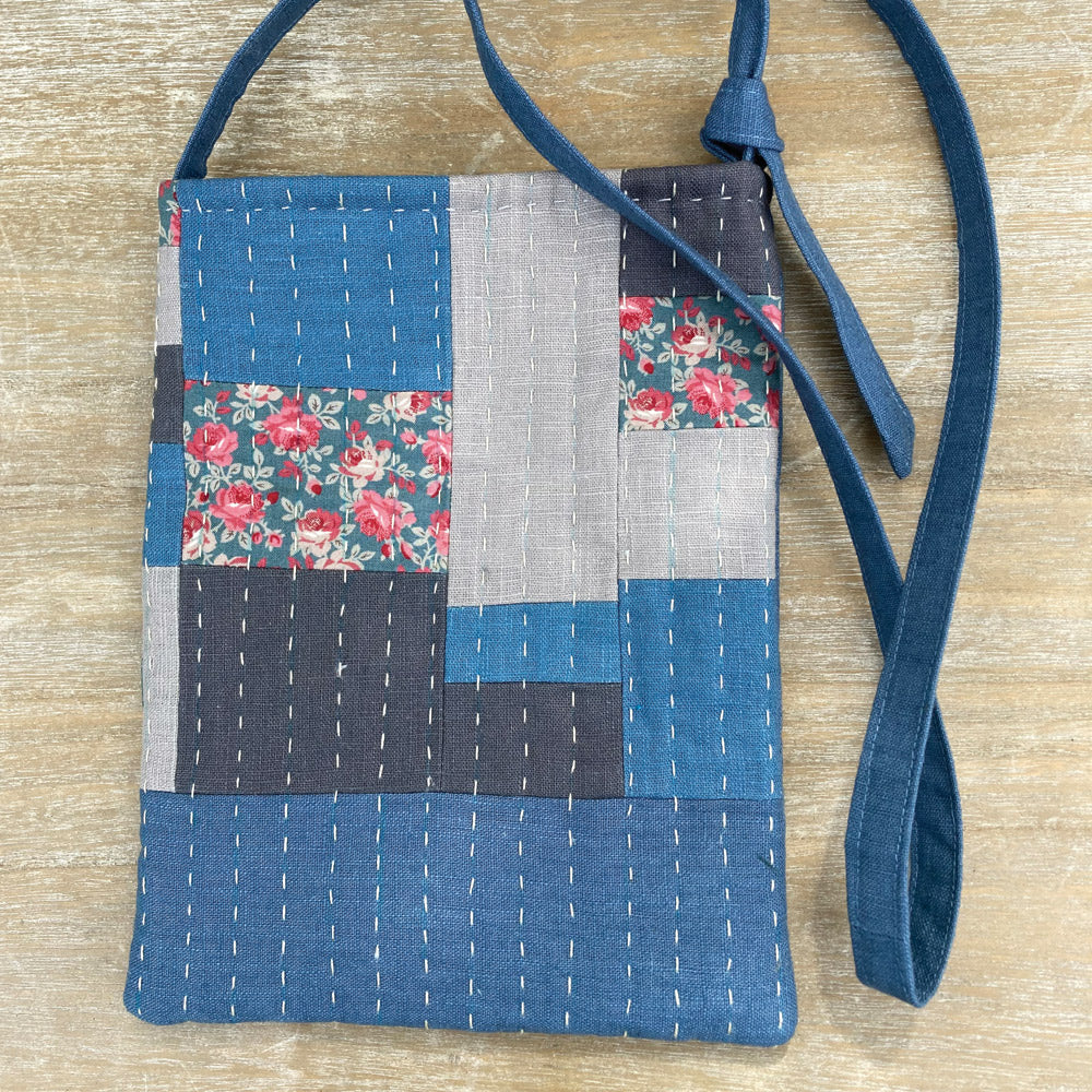 Fabric shoulder bag handmade from linen, cotton and denim. Blues and greys. Sewn in slow stitch.