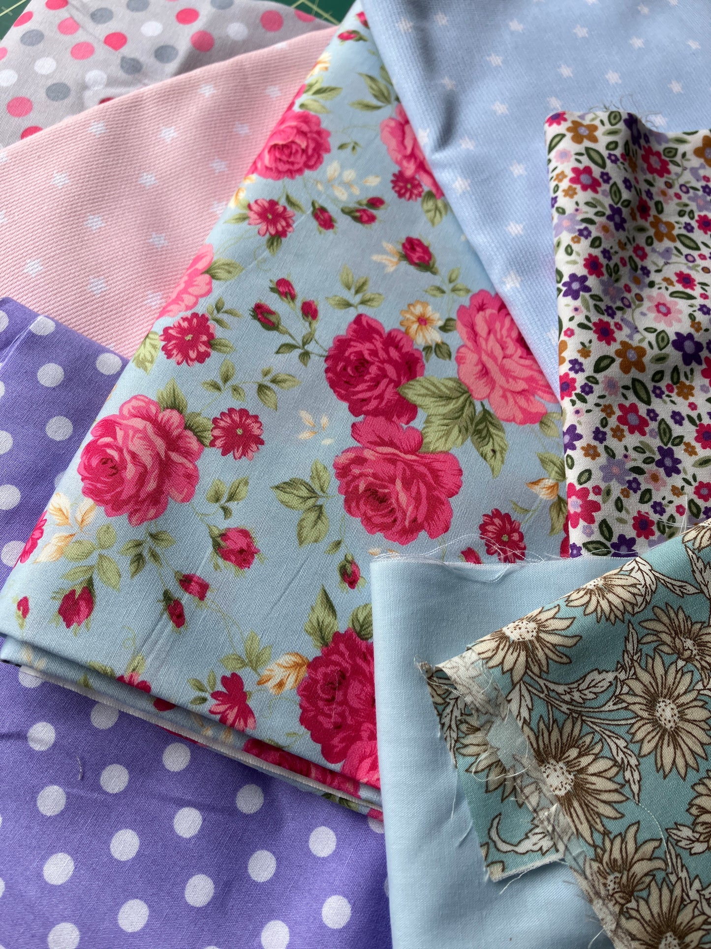 A bundle of scrap fabrics, suitable for crafting and textiles