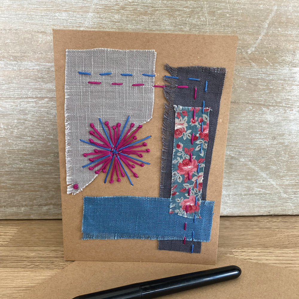 Handmade collage greetings card on natural craft card with envelope.