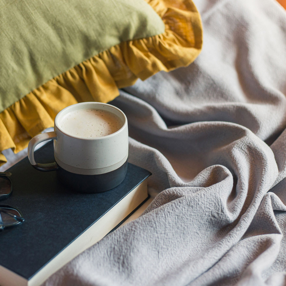 Pale Grey Linen Throw with Frill with coffee cup