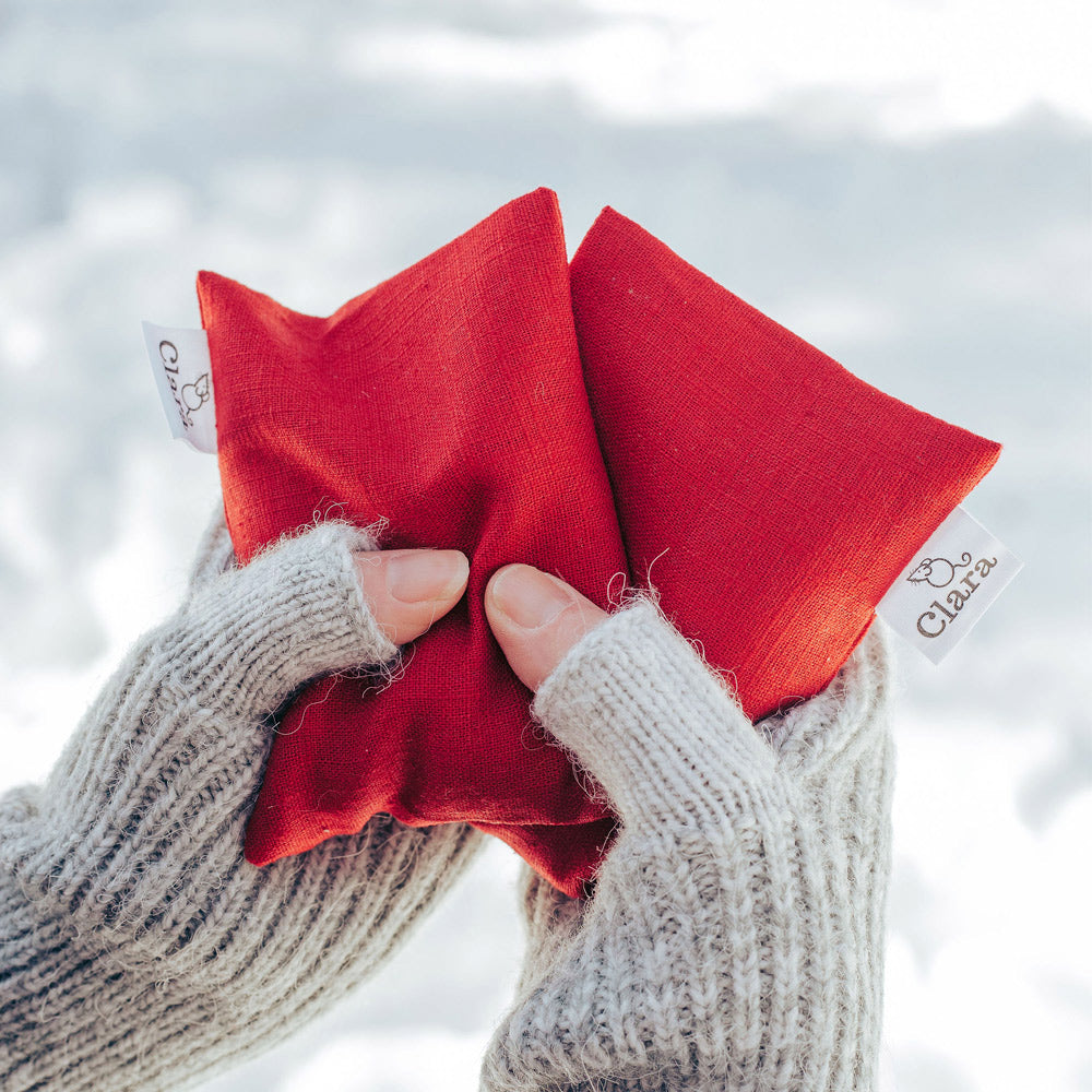 Cosy wheat filled microwavable hand warmers. Made from natural linen with cotton inner.