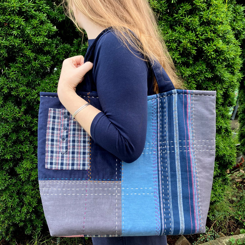 Extra large patchwork shopper bag in re-cycled and natural fabric with hand sewn slow stitch.