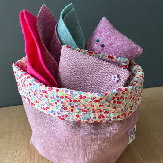 Pink fabric handmade childrens sewing bag with accessories