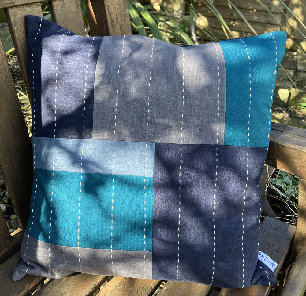 Square cushion handmade in luxury linen and cotton and hand slow stitched in sashiko threads.