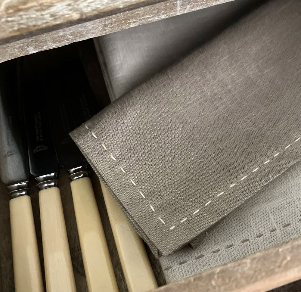 2 natural fabric napkins in colour taupe. slow hand stitch decoration.