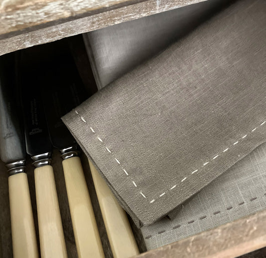 2 natural fabric napkins in colour taupe. slow hand stitch decoration.